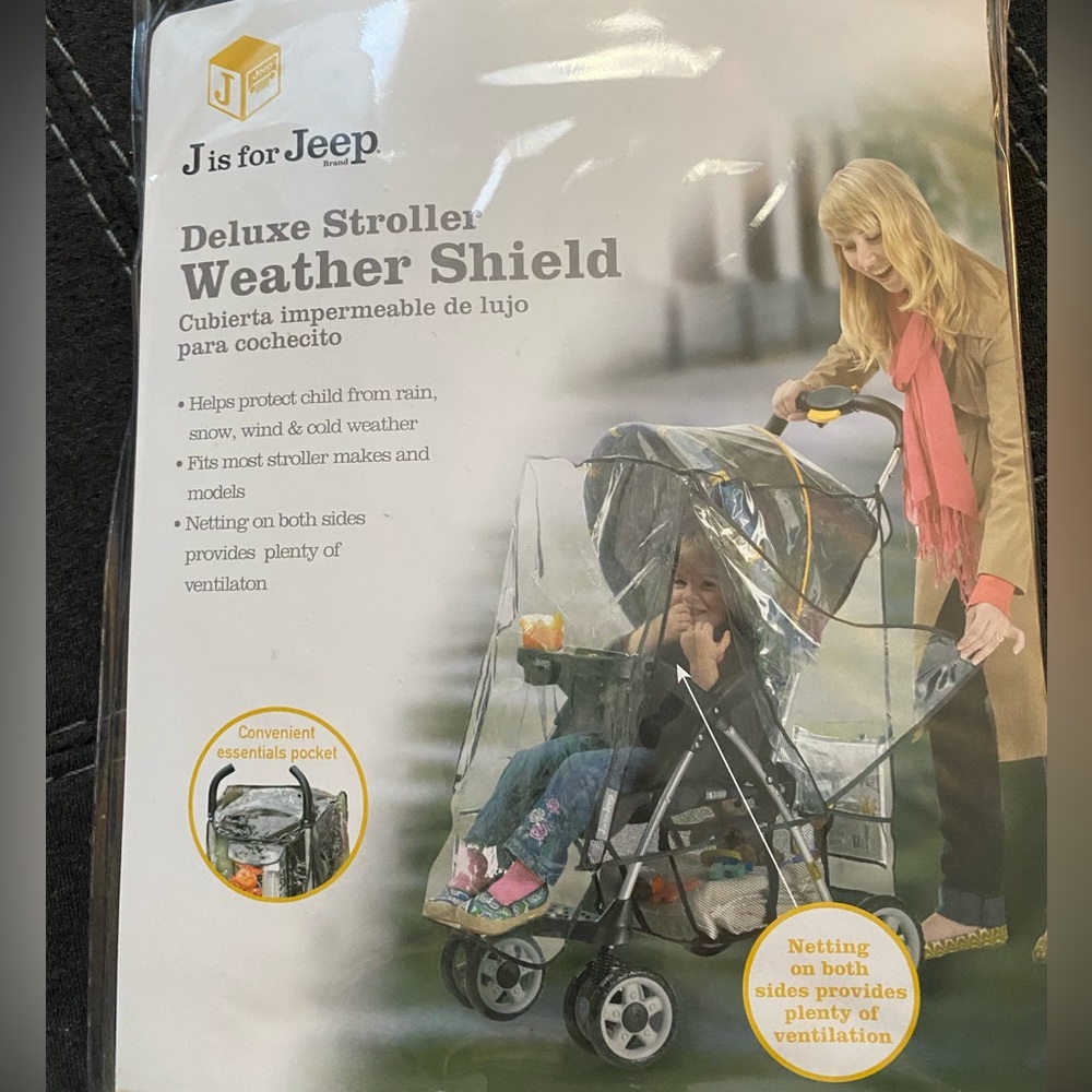 Weather stroller cover with ventilation on both sides.